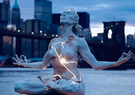 Glowing meditative figure representing spiritual insight and Akashic Record guidance