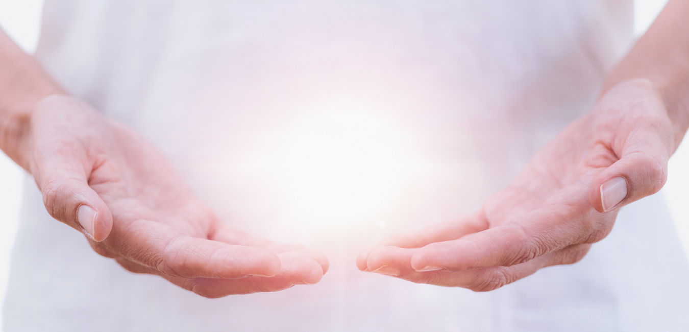 Woman in a calm reflective pose representing gentle spiritual support and healing